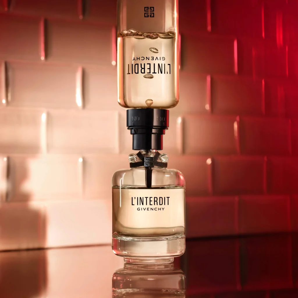 An image of Givenchy L'Interdit perfume with its refiller
