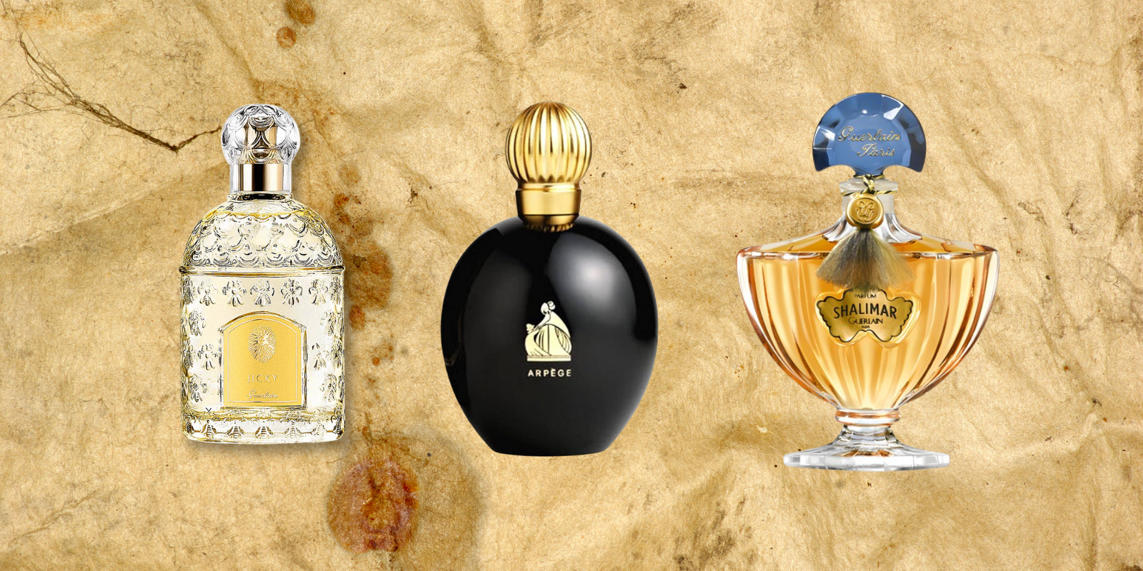 A weathered background containing 3 perfumes- Guerlain Jicky, Lanvin Arpege, Guerlain Shalimar