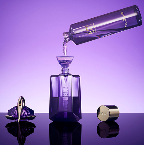 An image of Thiery Mugler Alien perfume with its refiller
