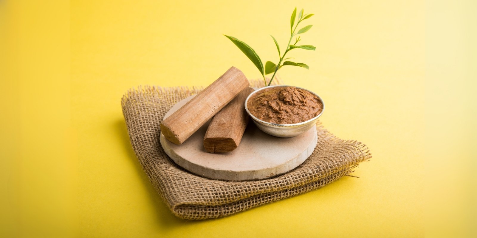 An image of sandalwood and its paste