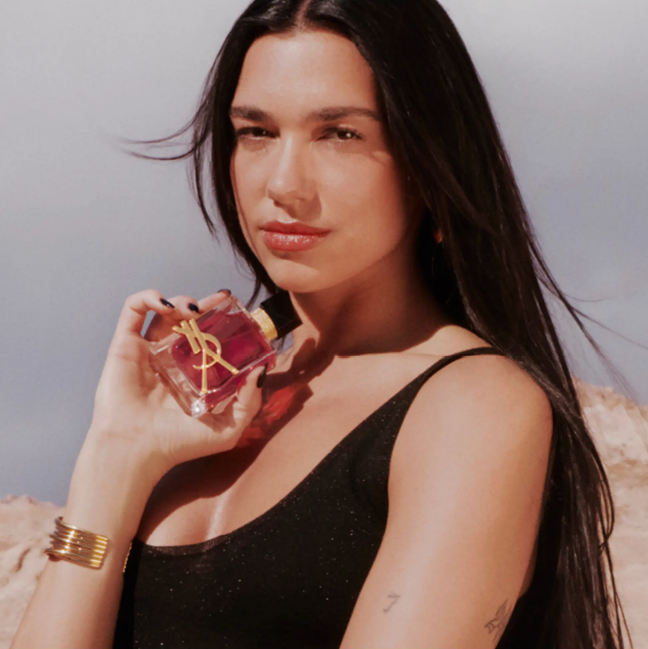 An image of Dua lipa with YSL perfume