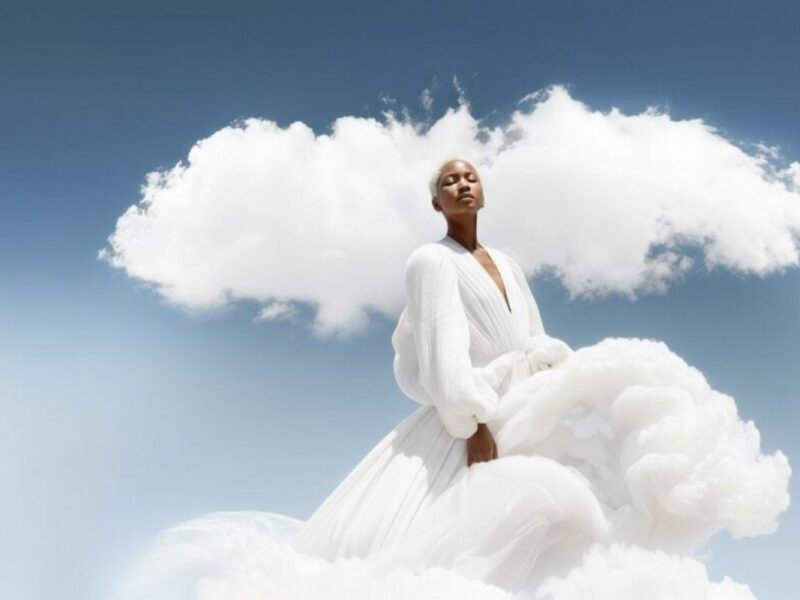 An image of a woman as cloud dancer