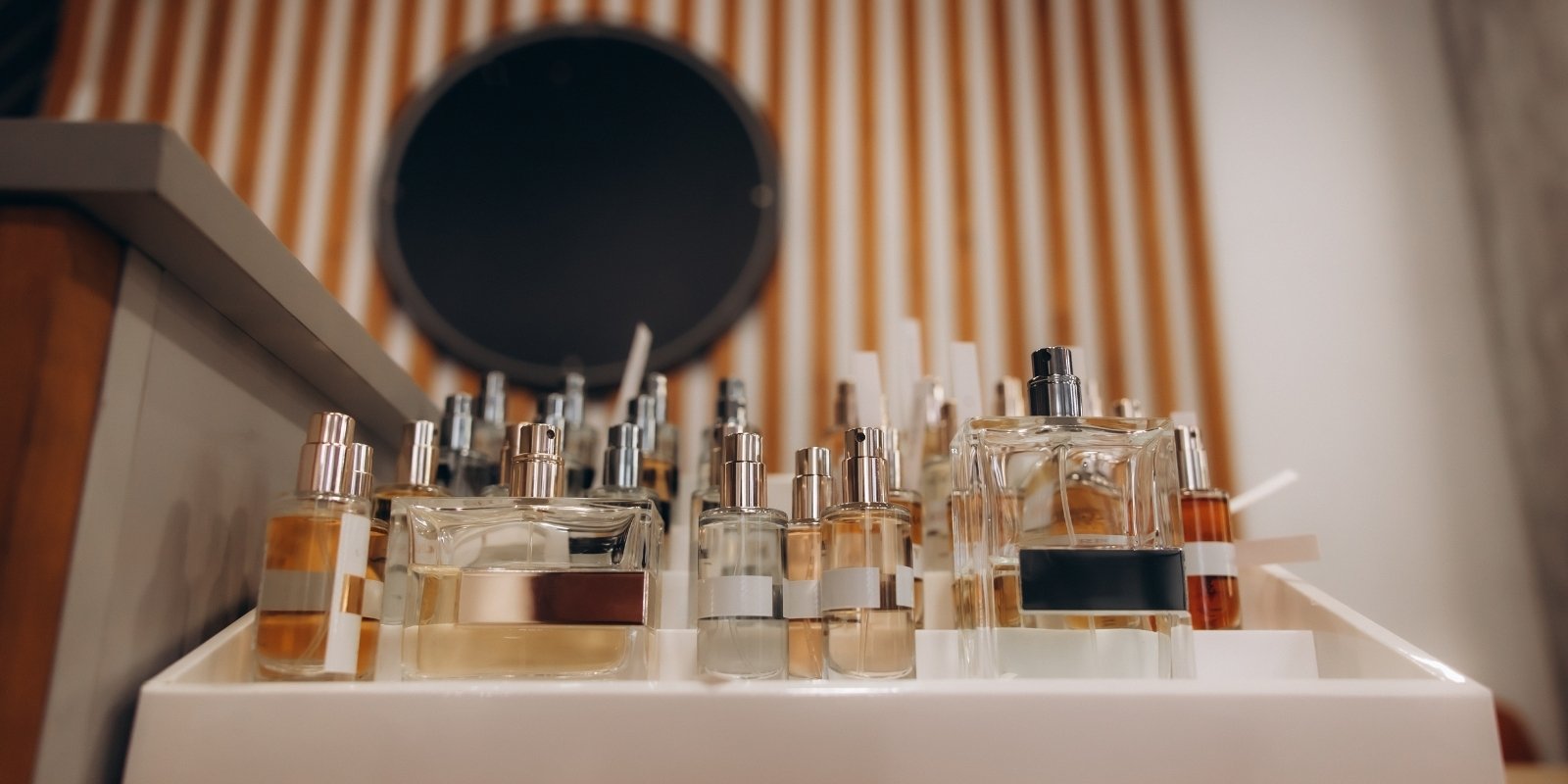 An image of perfumes in shelf